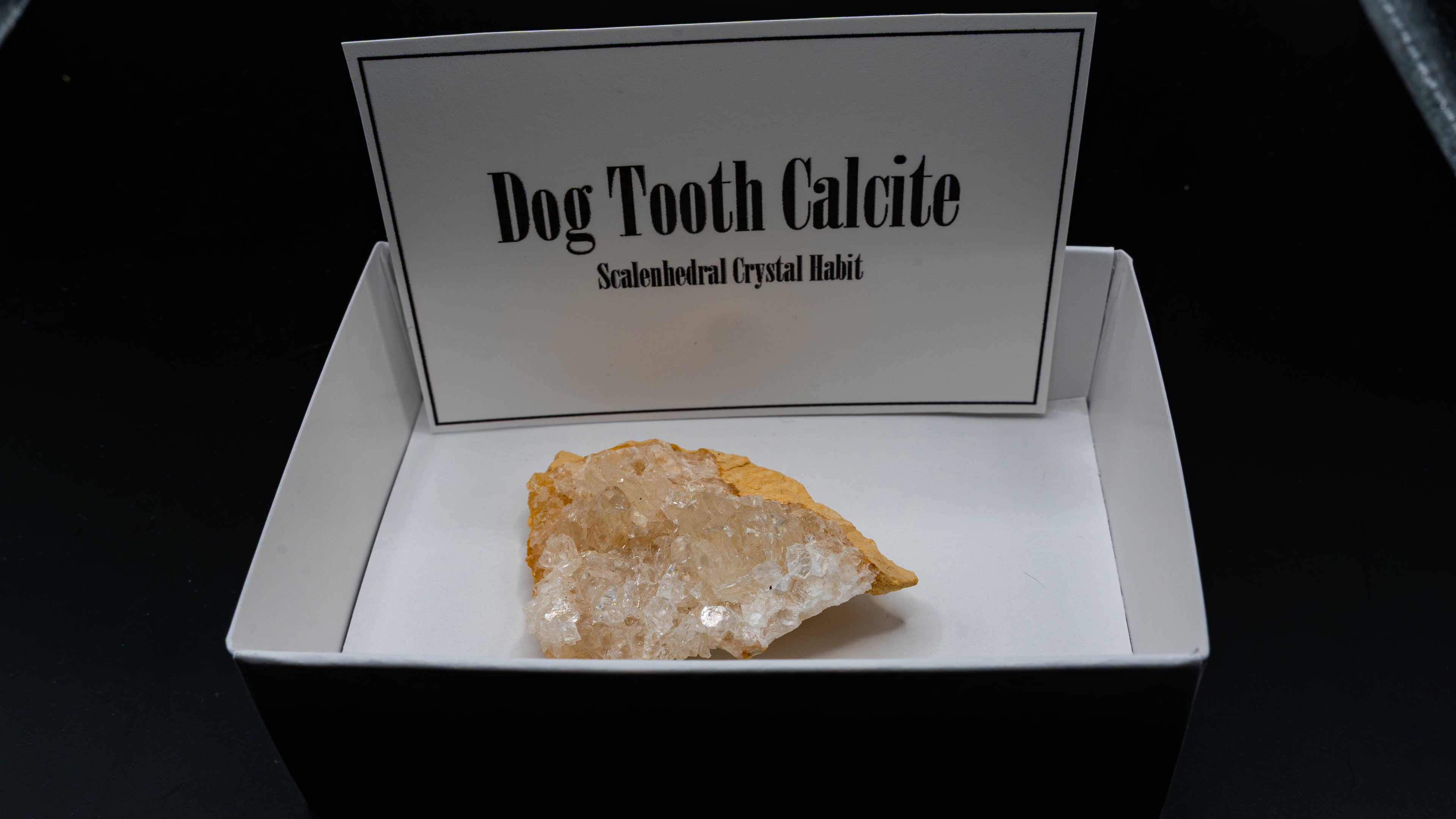 Dog Tooth Calcite (Scalenohedral) – Clear on Yellow Host Rock