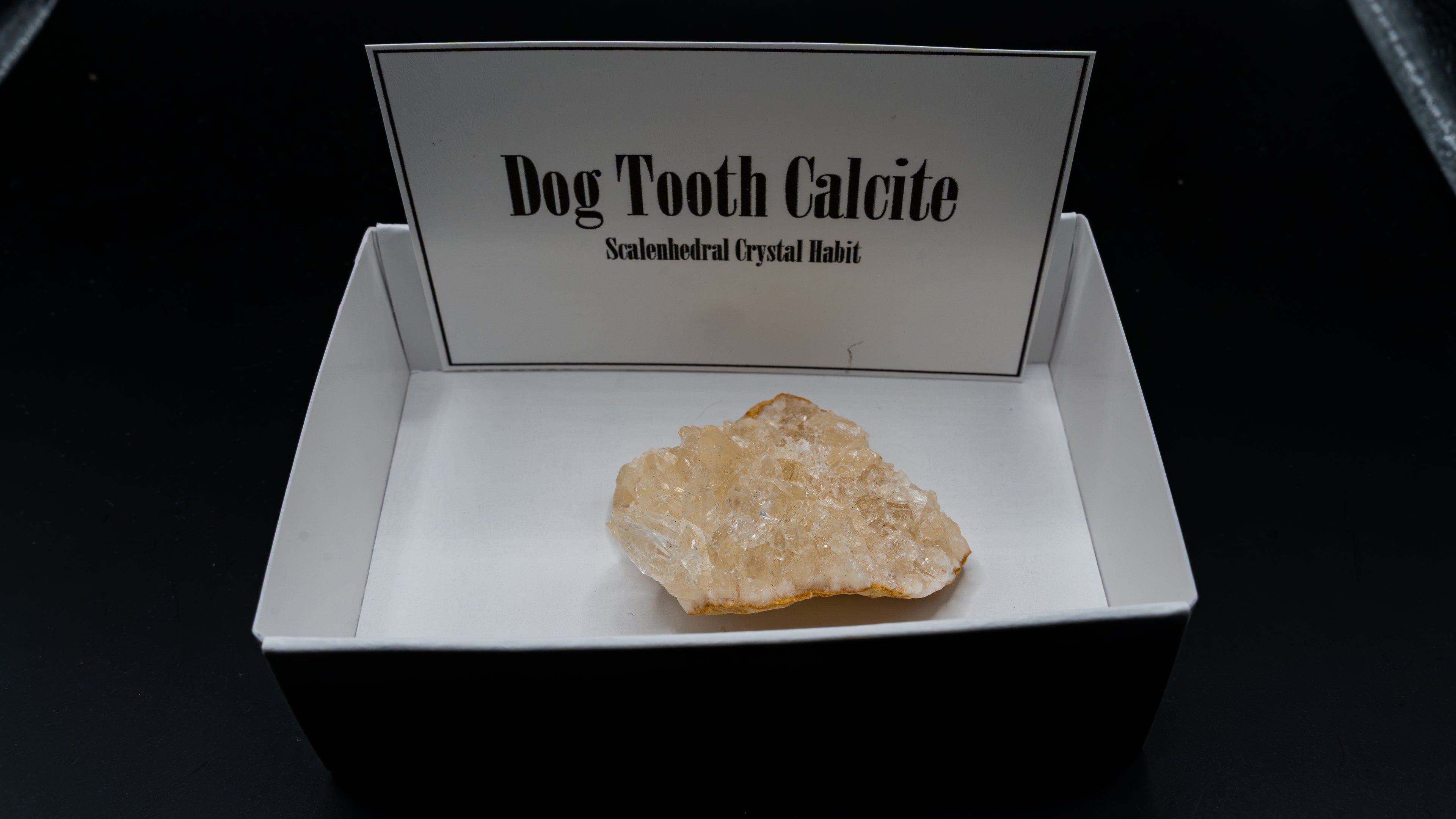 Dog Tooth Calcite (Scalenohedral) – Clear on Yellow Host Rock