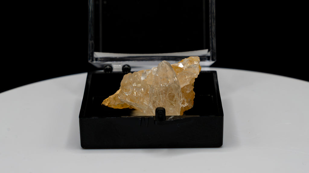 Dog Tooth Calcite (Scalenohedral) – Clear on Yellow Host Rock