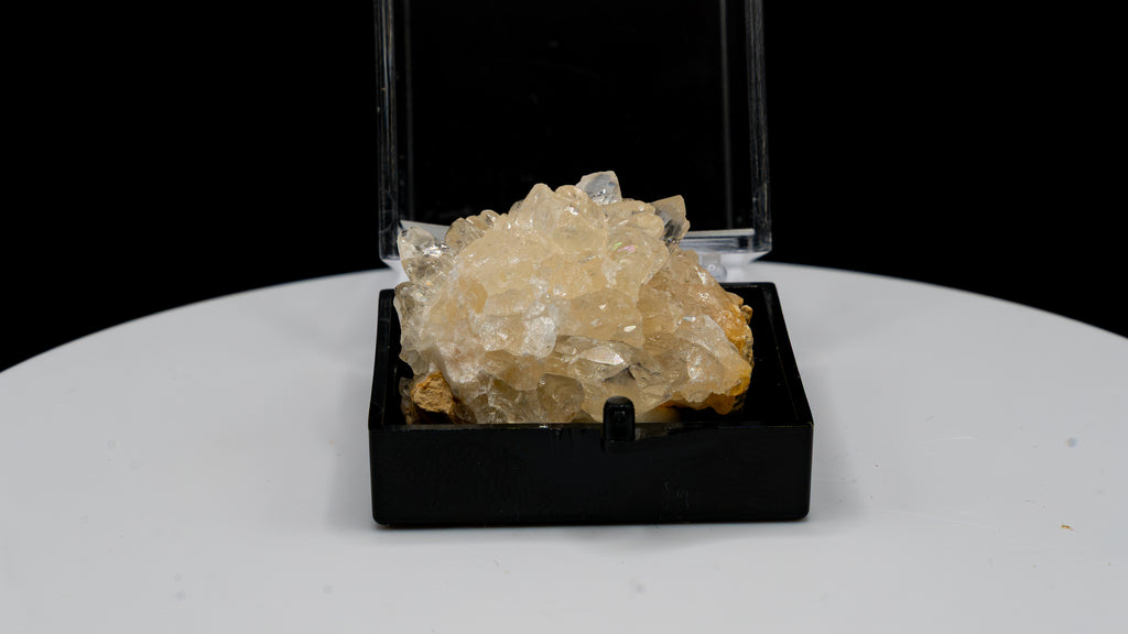 Dog Tooth Calcite (Scalenohedral) – Clear on Yellow Host Rock